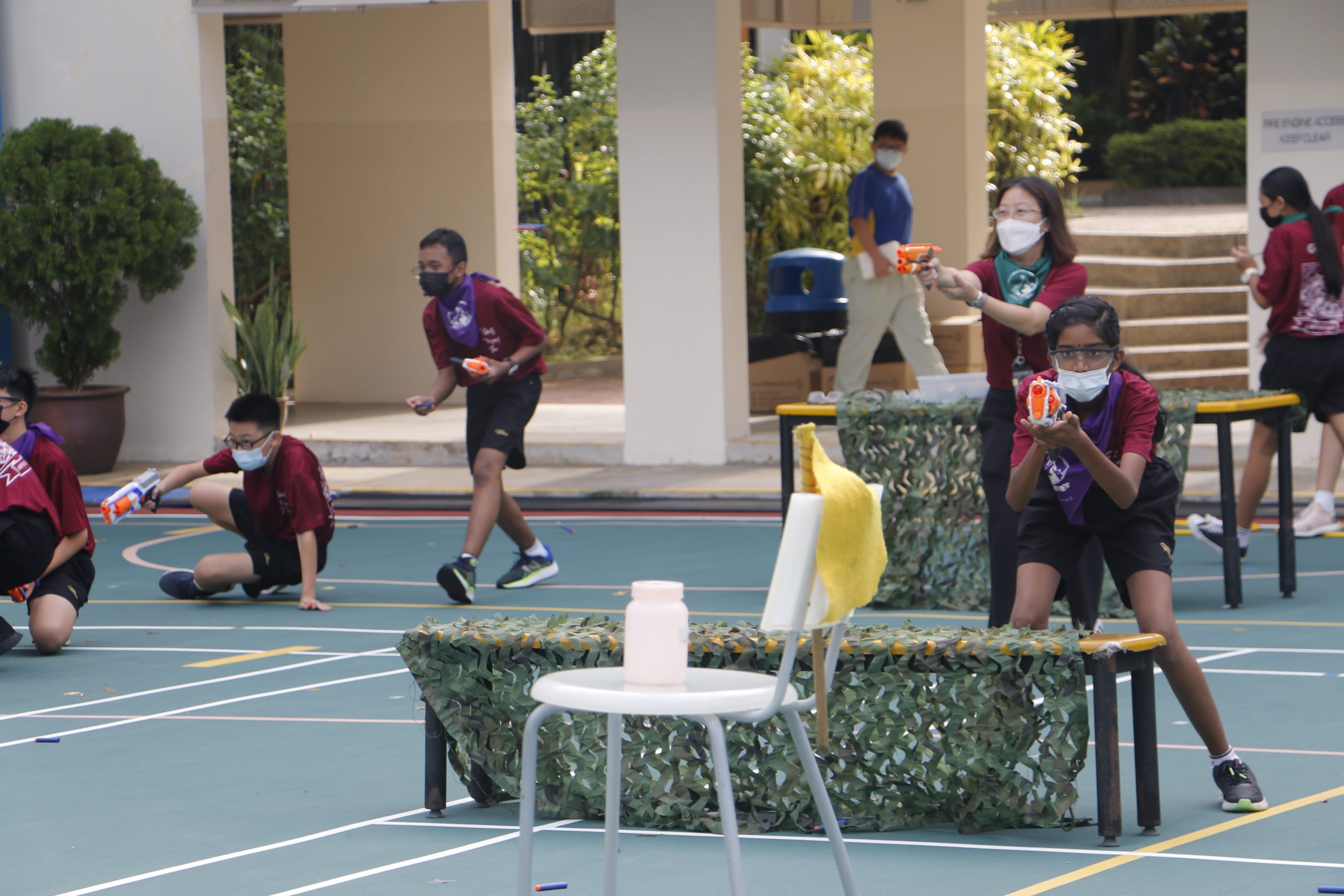 Sec 1 students playing a Nerf gun game as part of BC week.